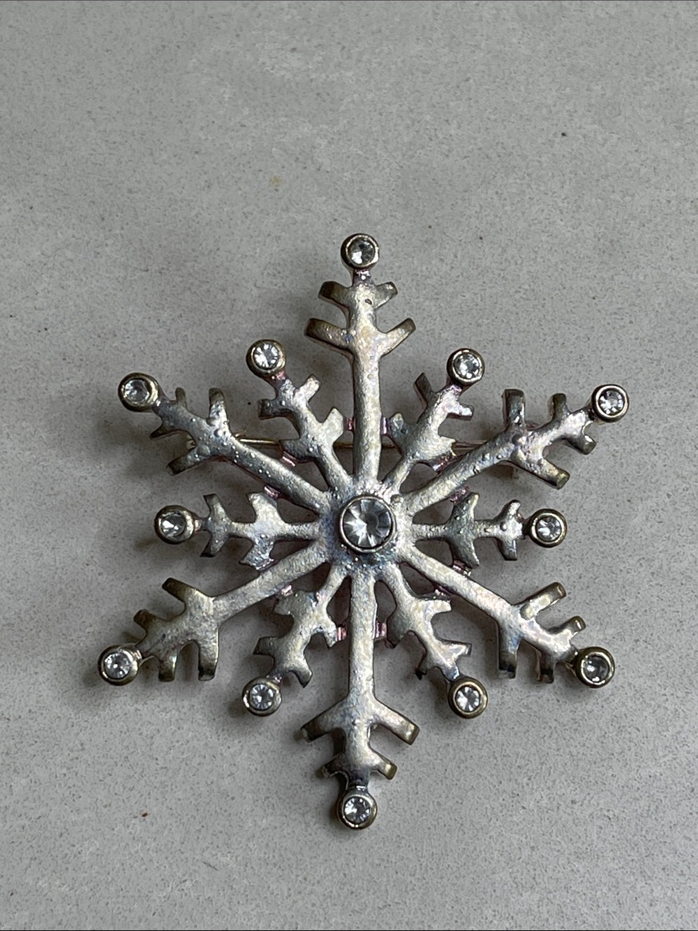Silver Snowflake Holiday Brooch with Rhinestones